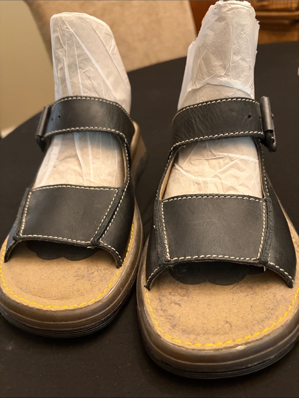 Dark brown Dr Martens sandals with Stitching. Slip on